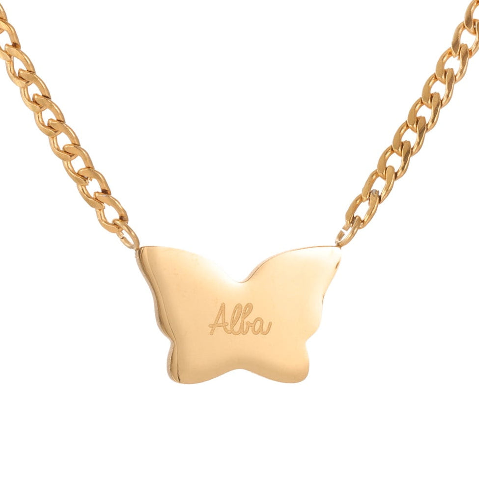 Gold butterfly necklace with 'Alba' engraving on a white background