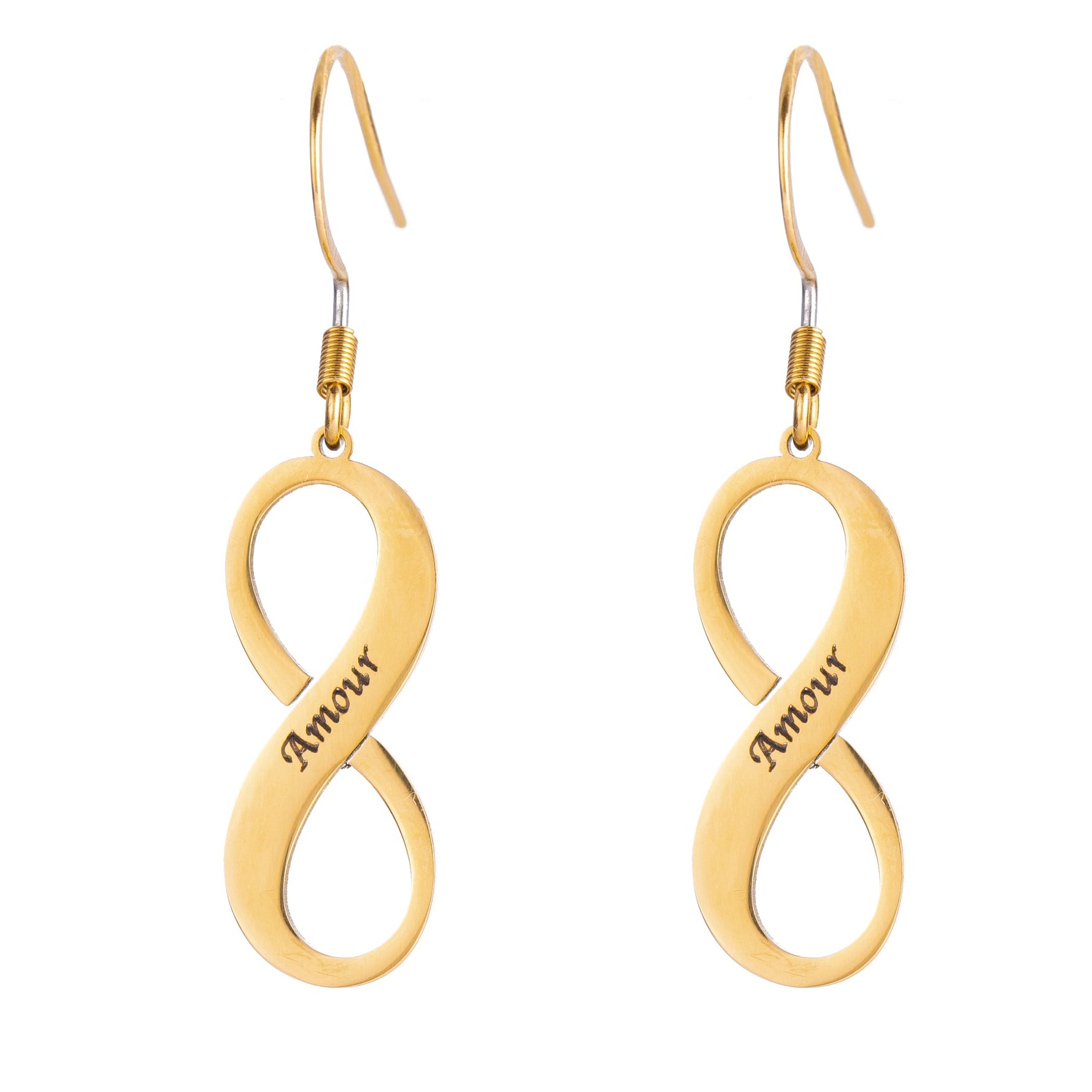 A pair of infinity symbol dangle earrings in gold color, with engraving in the middle, with the infinity sign suspended in air, isolated on a white background.