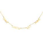 A gold-colored personalized necklace with multiple names engraved in bold uppercase letters on a chain.