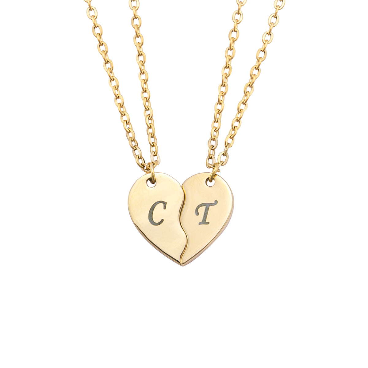 A gold-plated necklace with two heart-shaped pendants, each engraved with a single letter, 'C' and 'T'.